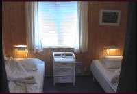 2 single beds in a bed room 26